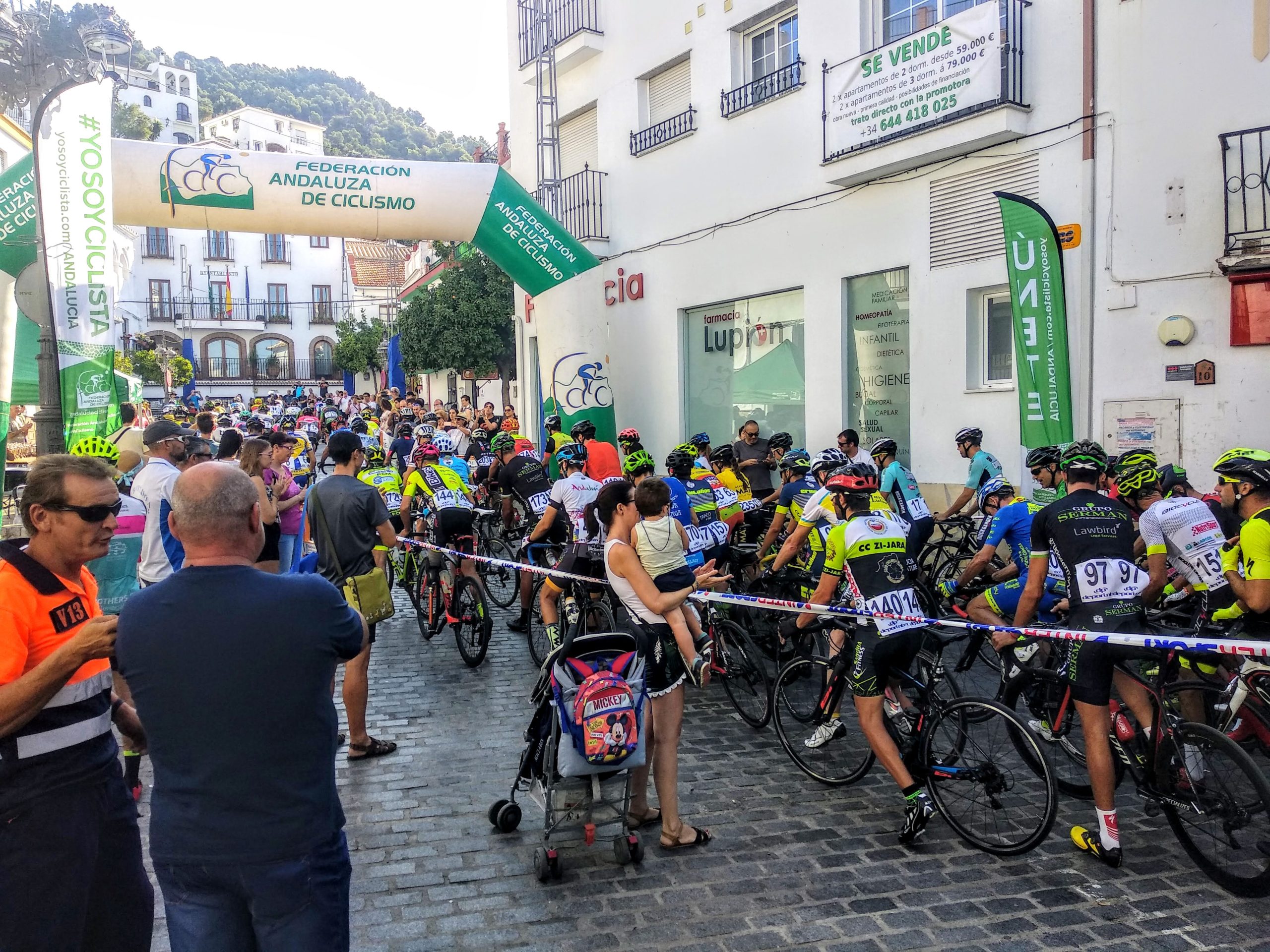 Image of bike race going through town square